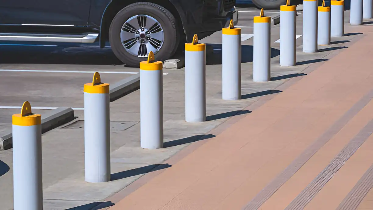 A new parking lot with fresh white stripes and yellow parking blocks