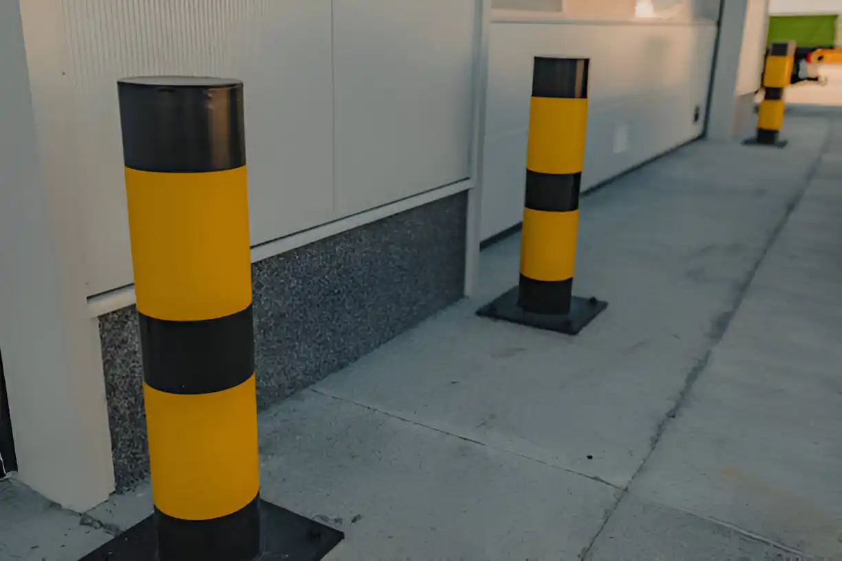 A black and yellow striped speed bump.
