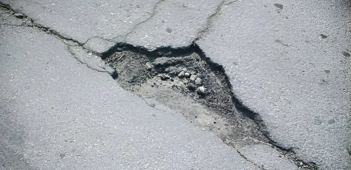 A concrete pothole