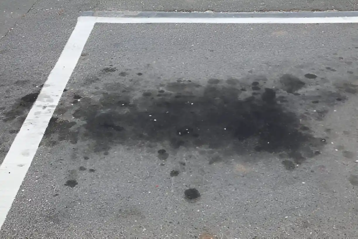 New parking blocks installed on a brick surface.